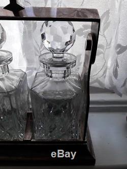 3 decanter tantalus silver plate complete with key & Crystal Cut decanters