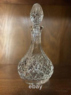 Cut crystal glass decanter with diamond pattern