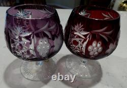 Two NACHTMANN TRAUBE AMETHYST AND RUBY RED CUT TO CLEAR BRANDY SNIFTERS