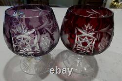 Two NACHTMANN TRAUBE AMETHYST AND RUBY RED CUT TO CLEAR BRANDY SNIFTERS