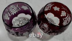 Two NACHTMANN TRAUBE AMETHYST AND RUBY RED CUT TO CLEAR BRANDY SNIFTERS