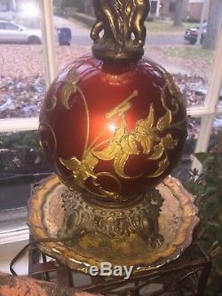 Vintage red globe lamp with cherubs crystal prisms and ruby red cut glass shade